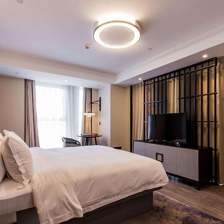Howard Johnson By Wyndham Life Zhuoyuan Ningbo Esterno foto
