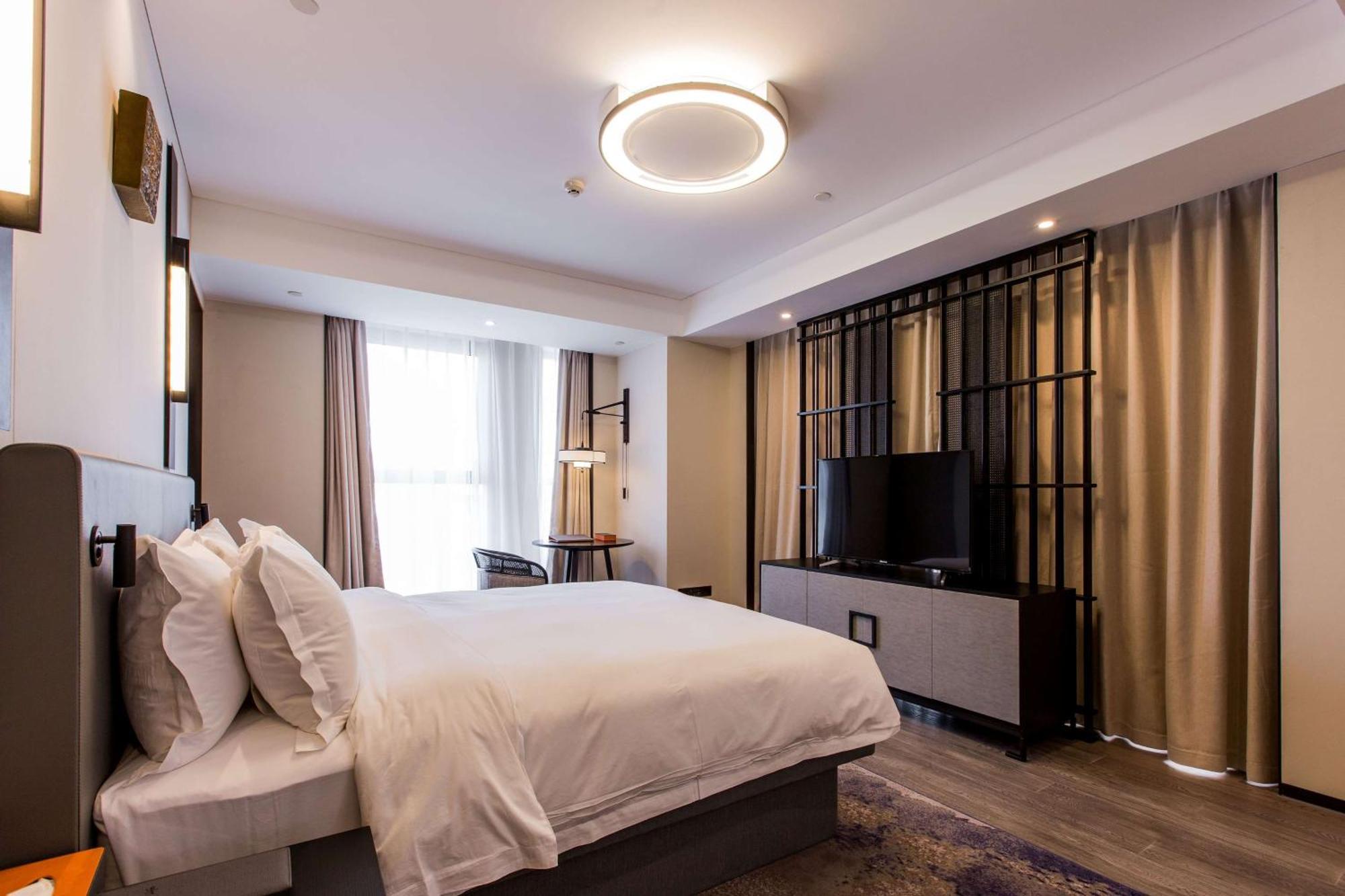 Howard Johnson By Wyndham Life Zhuoyuan Ningbo Esterno foto